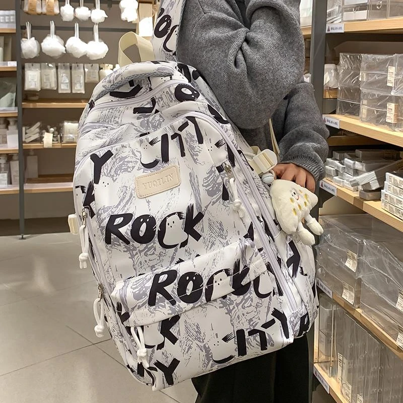 书包男生初中生高中生高颜值涂鸦背包2025新款大学生大容量双肩包