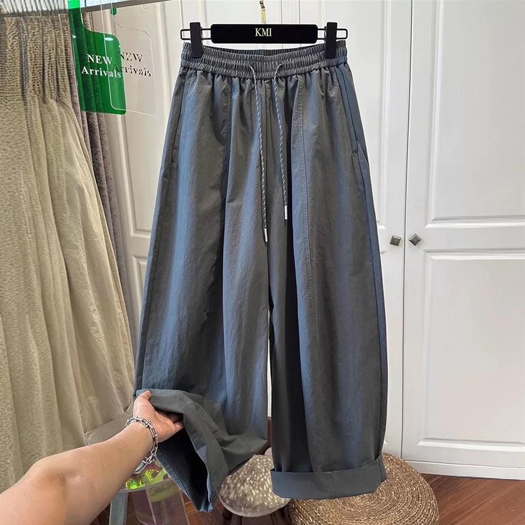灰绿色松紧腰抽绳休闲裤女弯刀裤2025韩版宽松褶皱气球裤夏季薄款