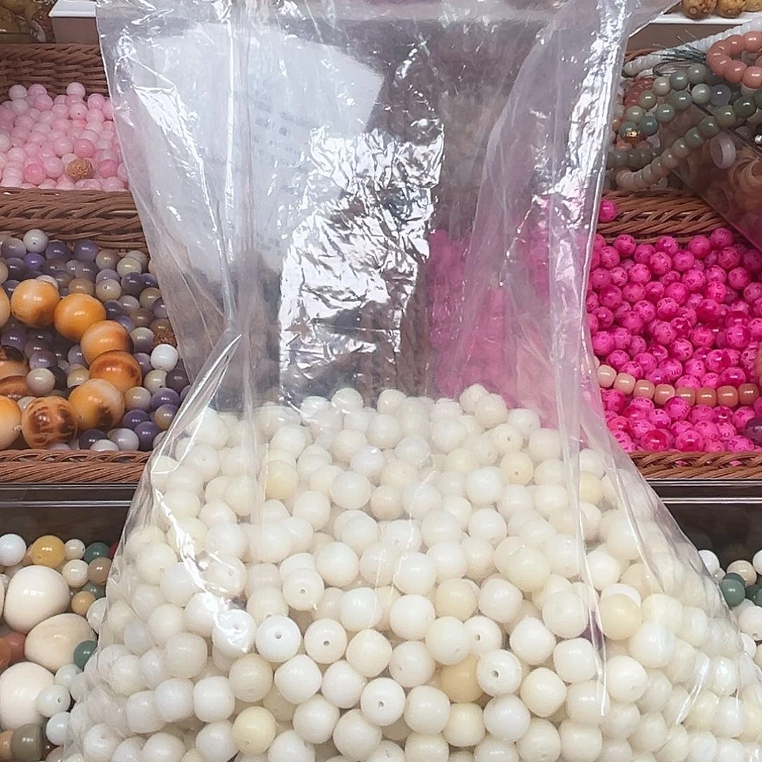 黄***哟菩提根/象牙果手串800左右颗桶珠微瑕