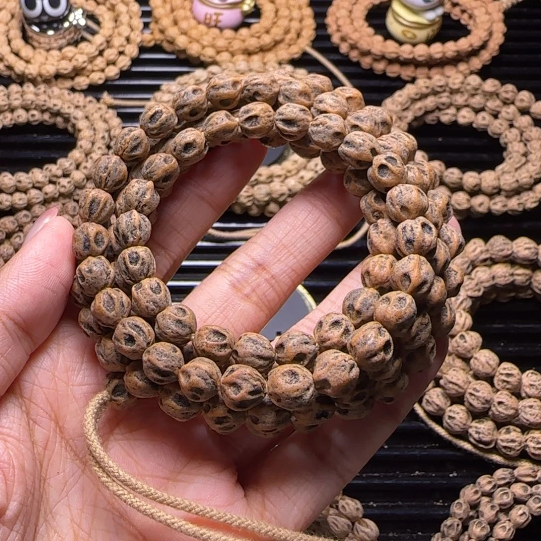 聻***䌳柏香籽/百香籽吊坠