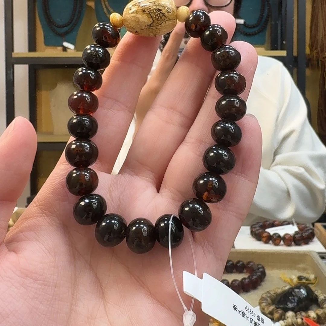 A***n琥珀未镶嵌裸石抚顺琥珀10mm血翳干白