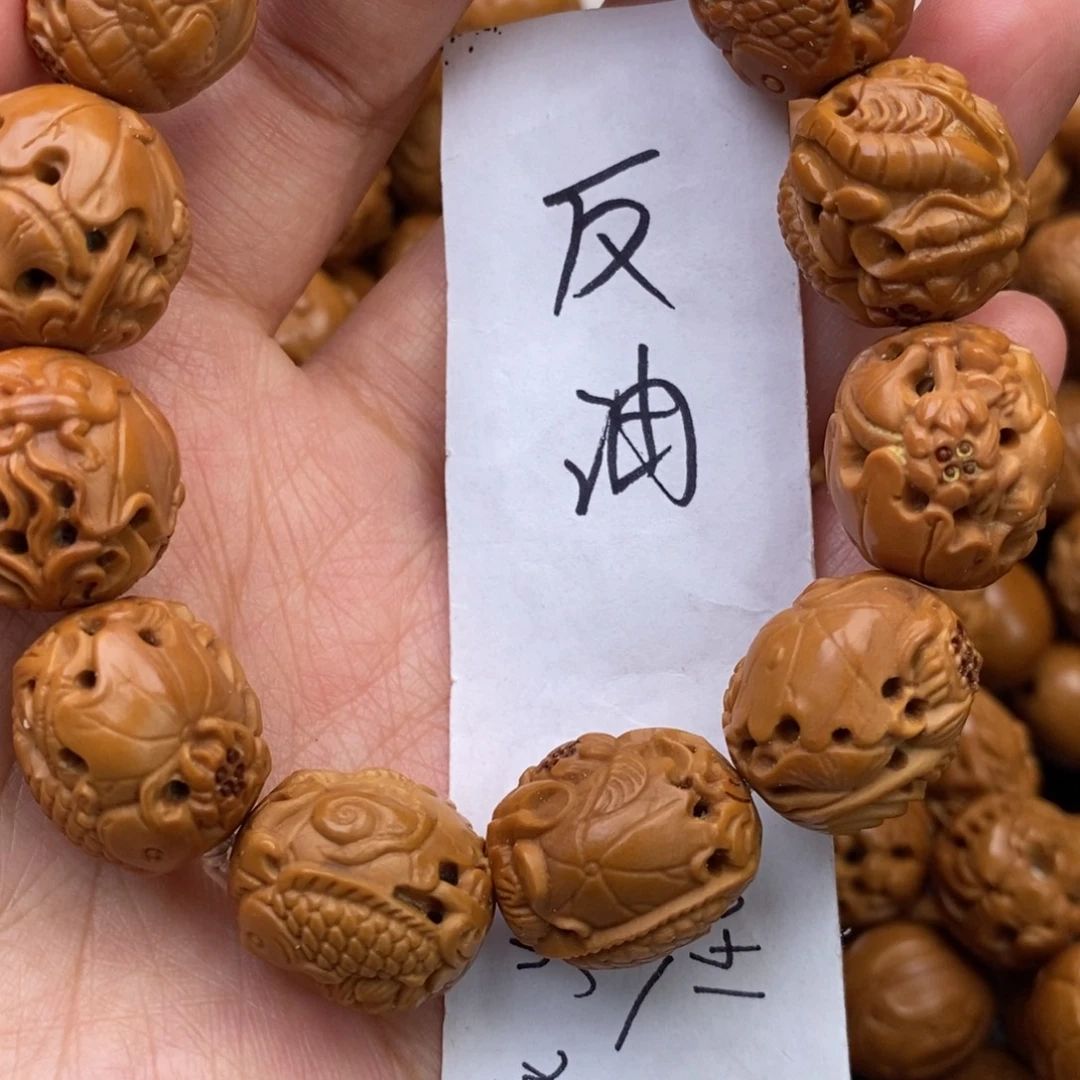橄榄核手串镂空鱼特价