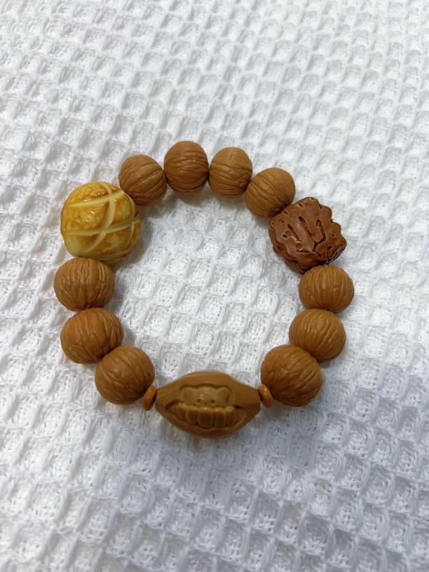 全品凤羽猴头象牙果菠萝包 橄榄核牛角包手串菩提根38