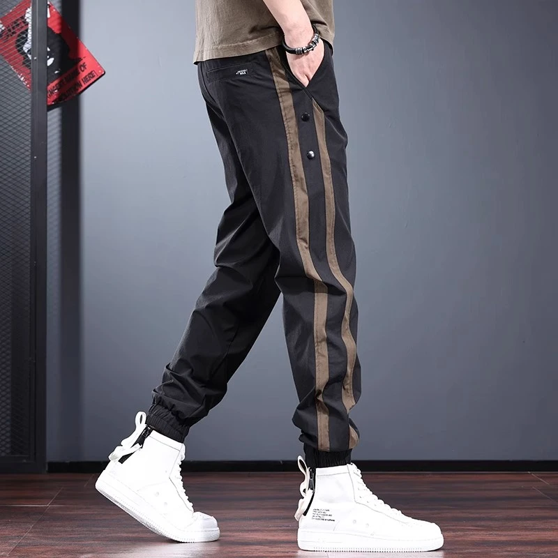 高端休闲裤男潮牌梭织运动裤2025新款高级感条纹撞色束脚速干裤