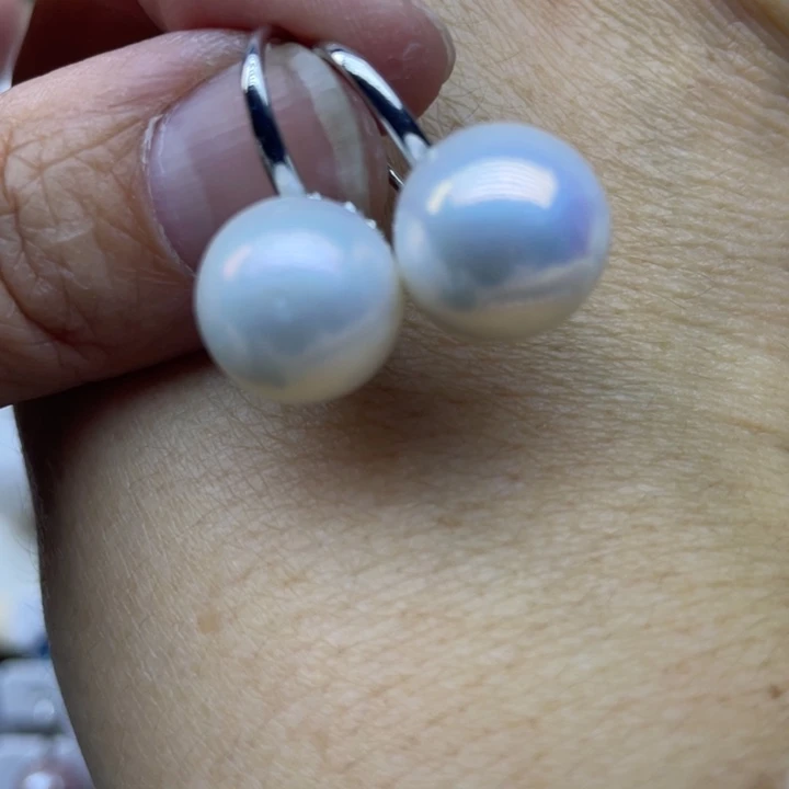 刘***利未镶嵌淡水珍珠耳饰