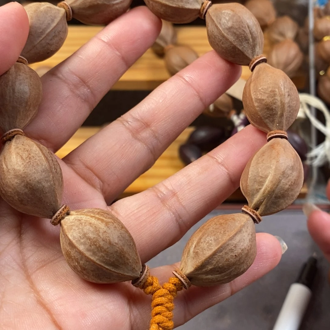 阿***.橄榄核手串/手链1.7❌27精品铁核