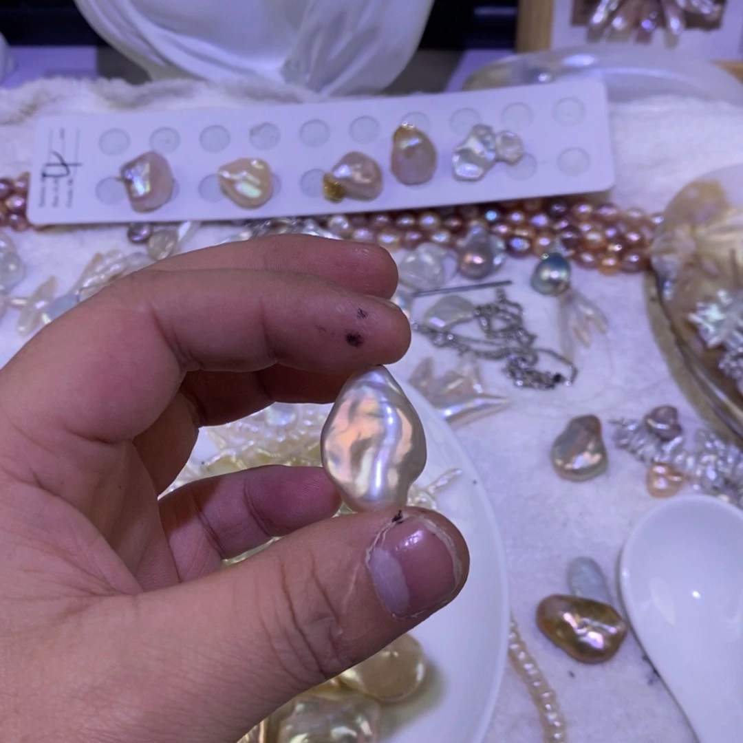 笑***笑未镶嵌淡水珍珠耳饰