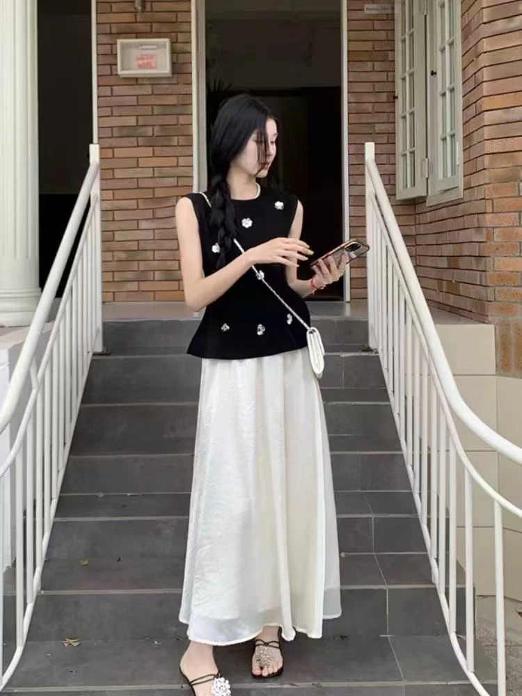 御姐黑色立体花朵无袖背心2025春夏新款气质高腰修身半身裙套装女
