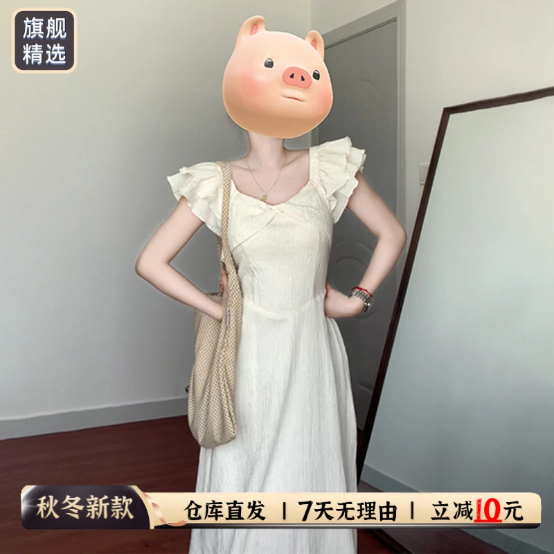 小飞袖白色连衣裙子女装秋冬2025新款设计感小众法式气质收腰长裙