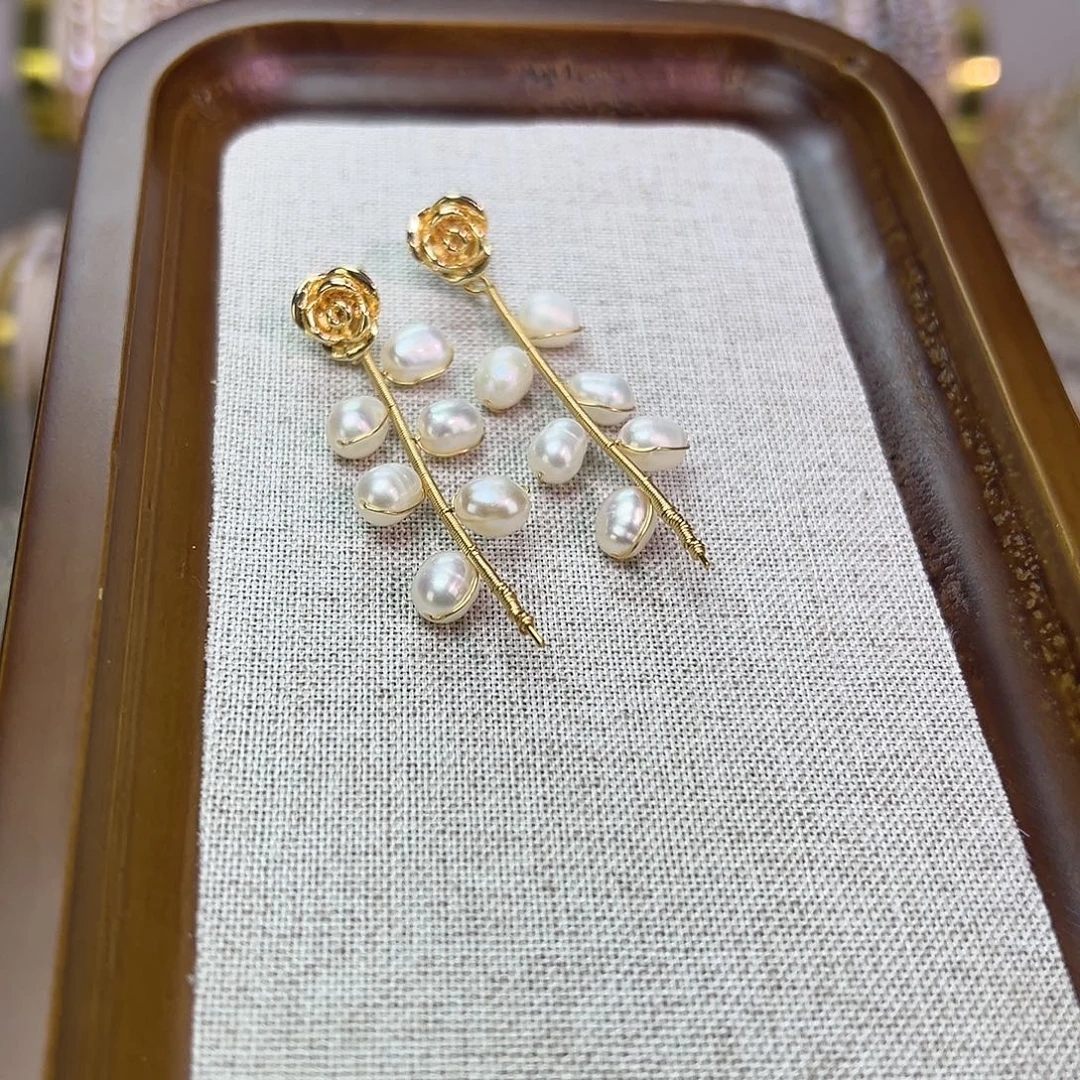 淡水珍珠银S925镶嵌耳饰