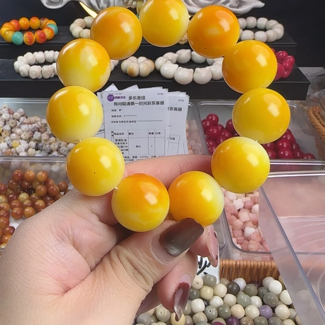 手串菩提根/象牙果瑕疵卡20橘色圆1串