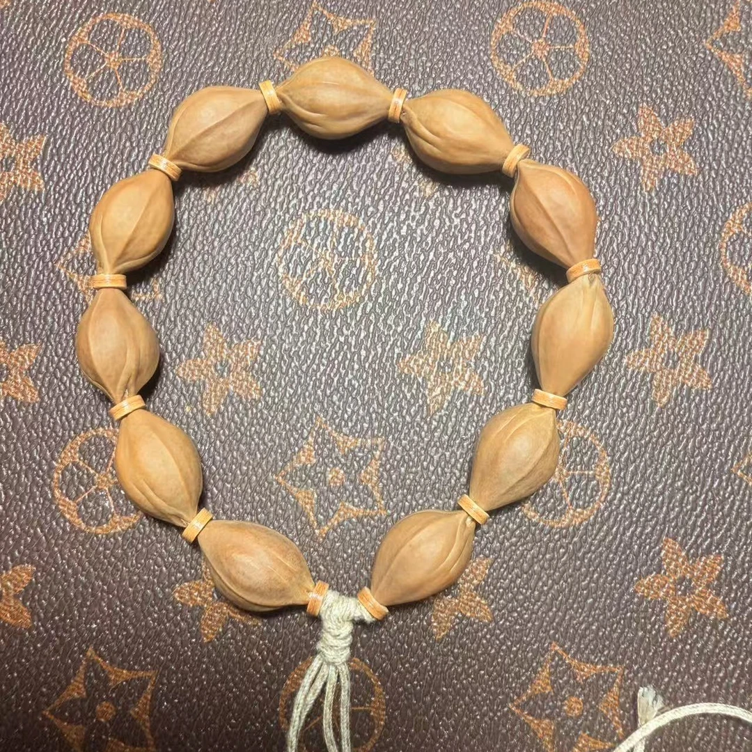 梅林铁核原生态素串14*23三面佛