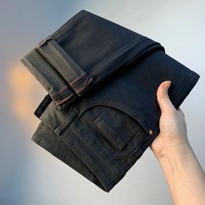 高端轻奢男士牛仔裤春秋新款纯黑色修身弹力小脚裤弹力修身长裤