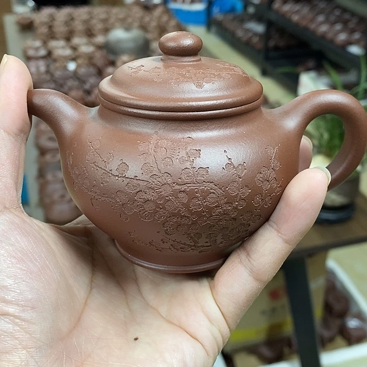 紫砂茶杯掇子刻绘梅花