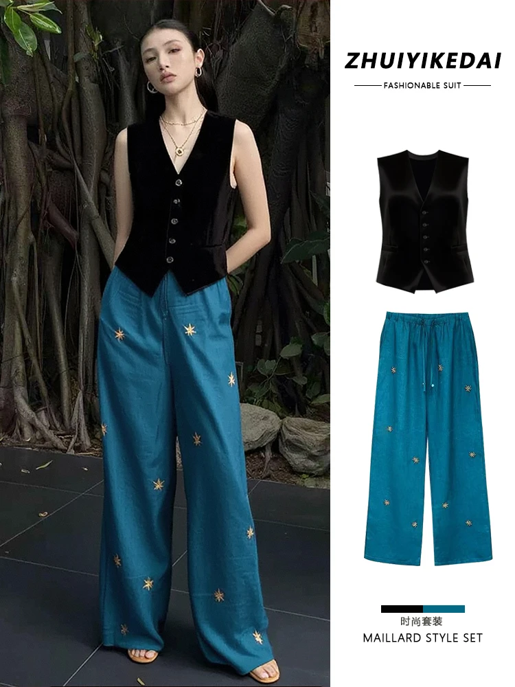 巨好看夏日贵气感御姐穿搭休闲时尚黑色无袖马甲孔雀蓝裤子套装女