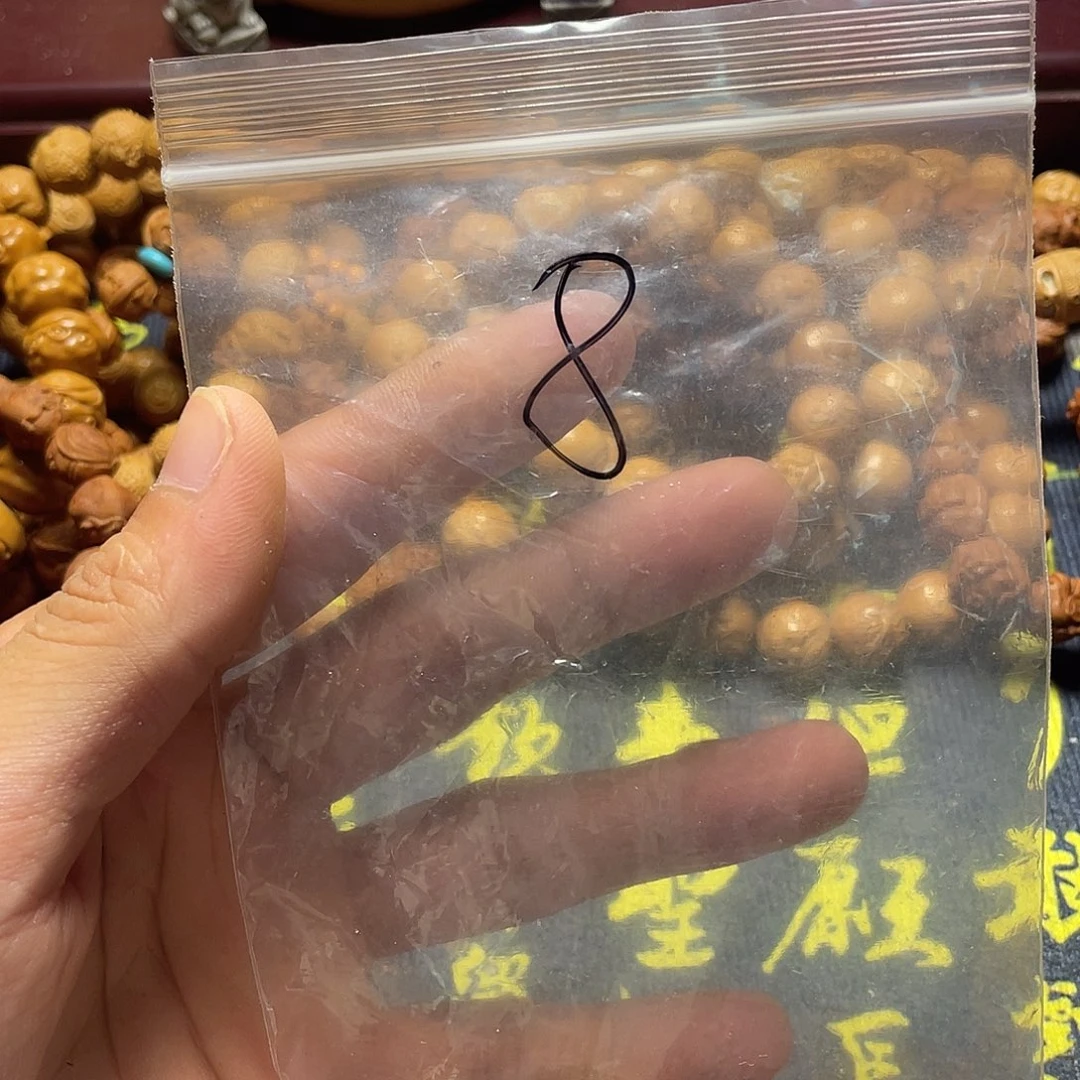 ?**叔橄榄核雕刻瑕疵单籽