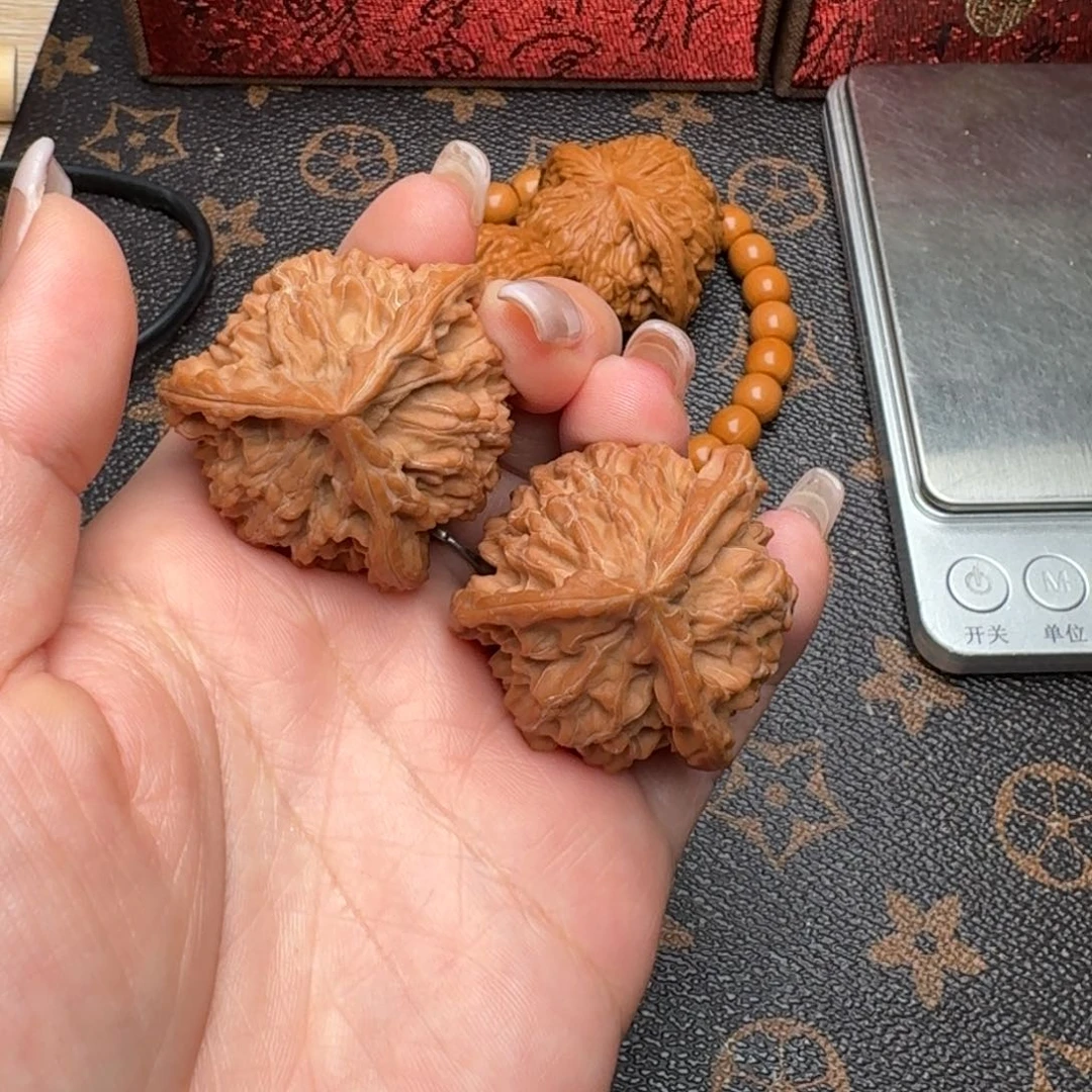 ****憶文玩核桃把件38三棱M151