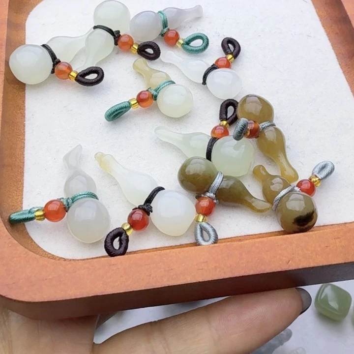 小***e和田玉（糖玉）未镶嵌车挂