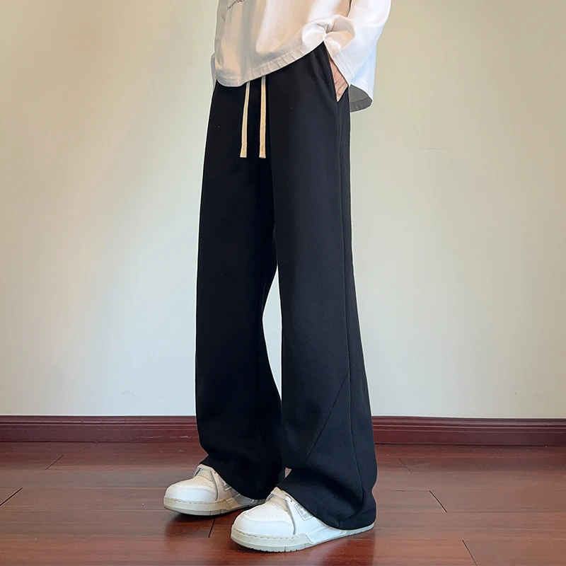 霄桂姿男秋季休闲裤潮流百搭斜切微喇直筒裤简约宽松长裤子卫裤男