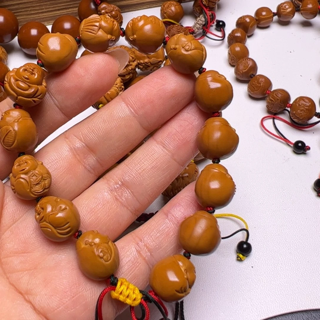 橄榄核手串啦****枫橄榄核雕刻