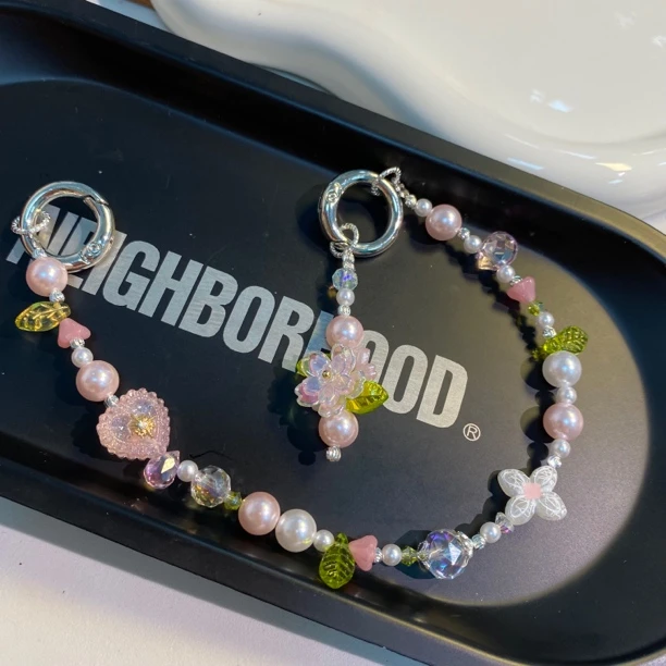 799粉系花球手机链