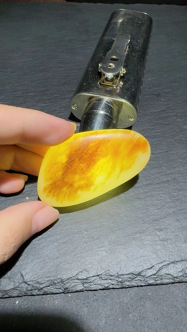 新疆和田玉精品洒金皮手把件