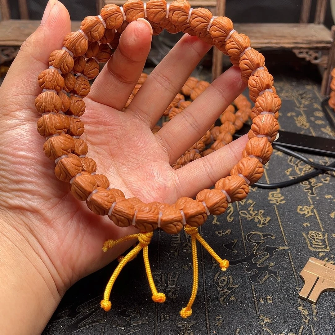 桃核吊坠玉龙手持