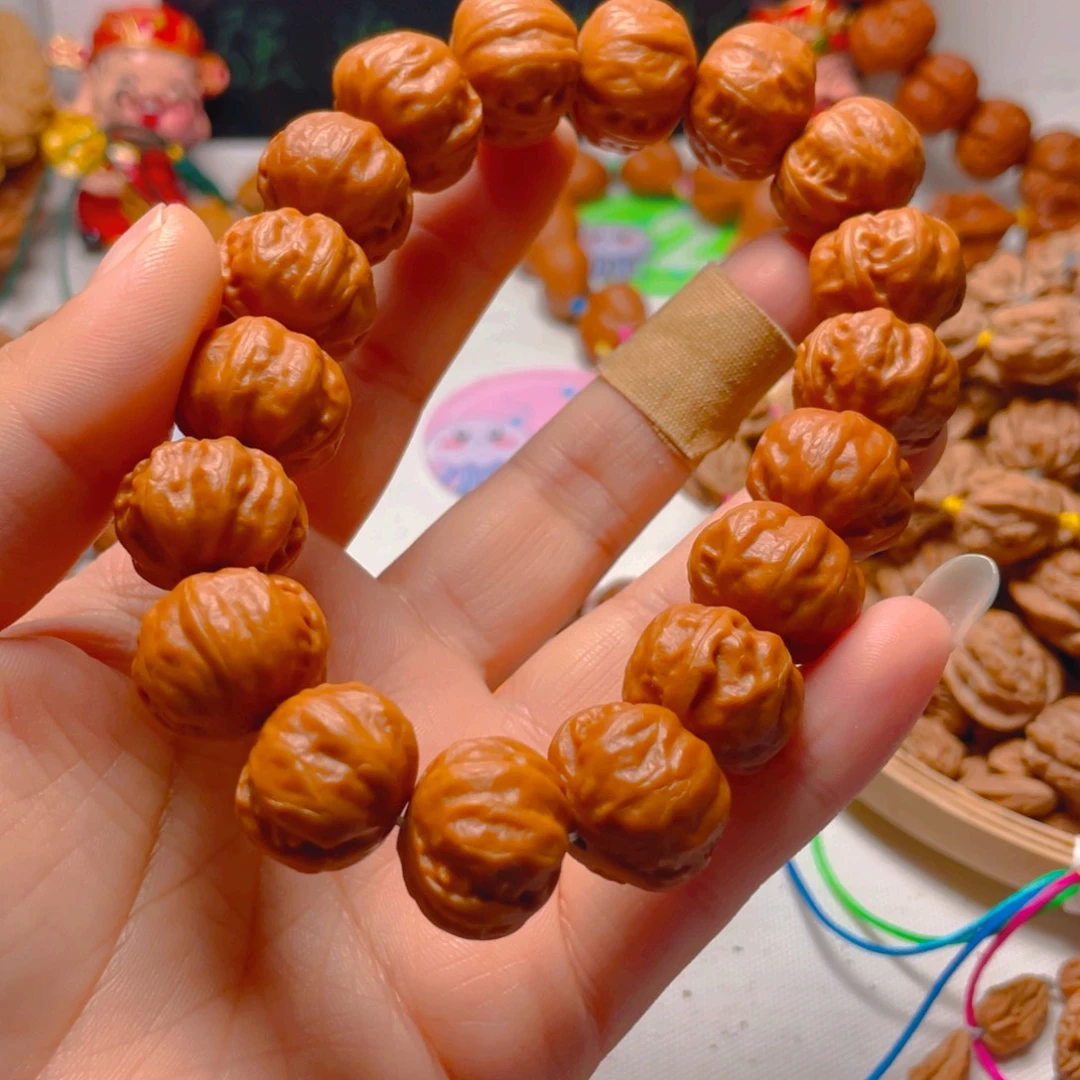 東***华手串文玩核桃磨盘