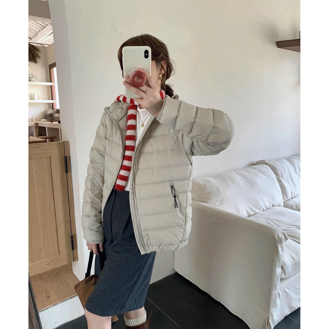 2025冬季新款时尚排骨棉服女气质轻薄连帽大码洋气显瘦保暖短外套