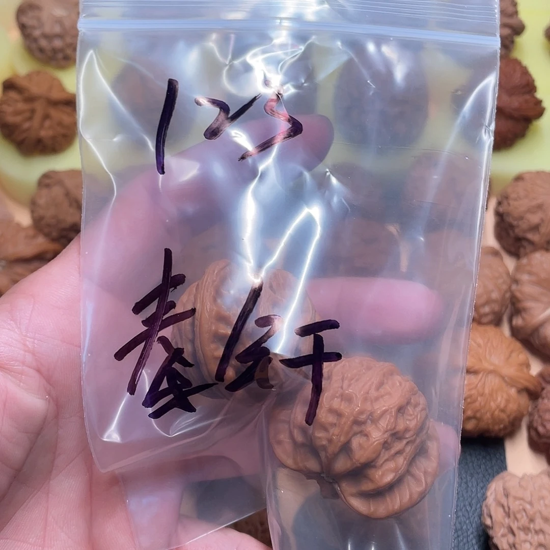 秦***轩吊坠文玩核桃战骨