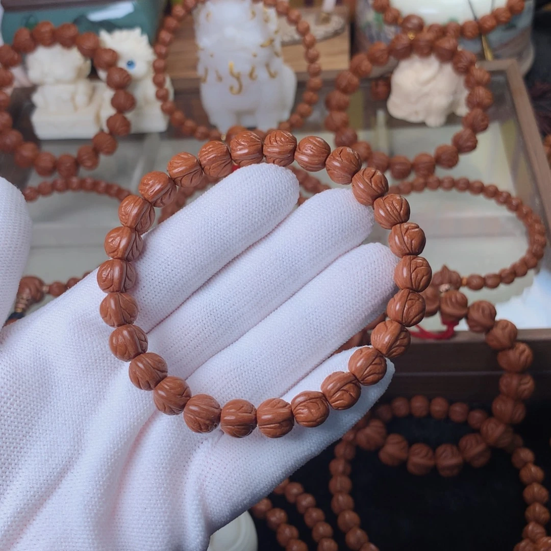 寻***4桃核吊坠玉龙脊手串09