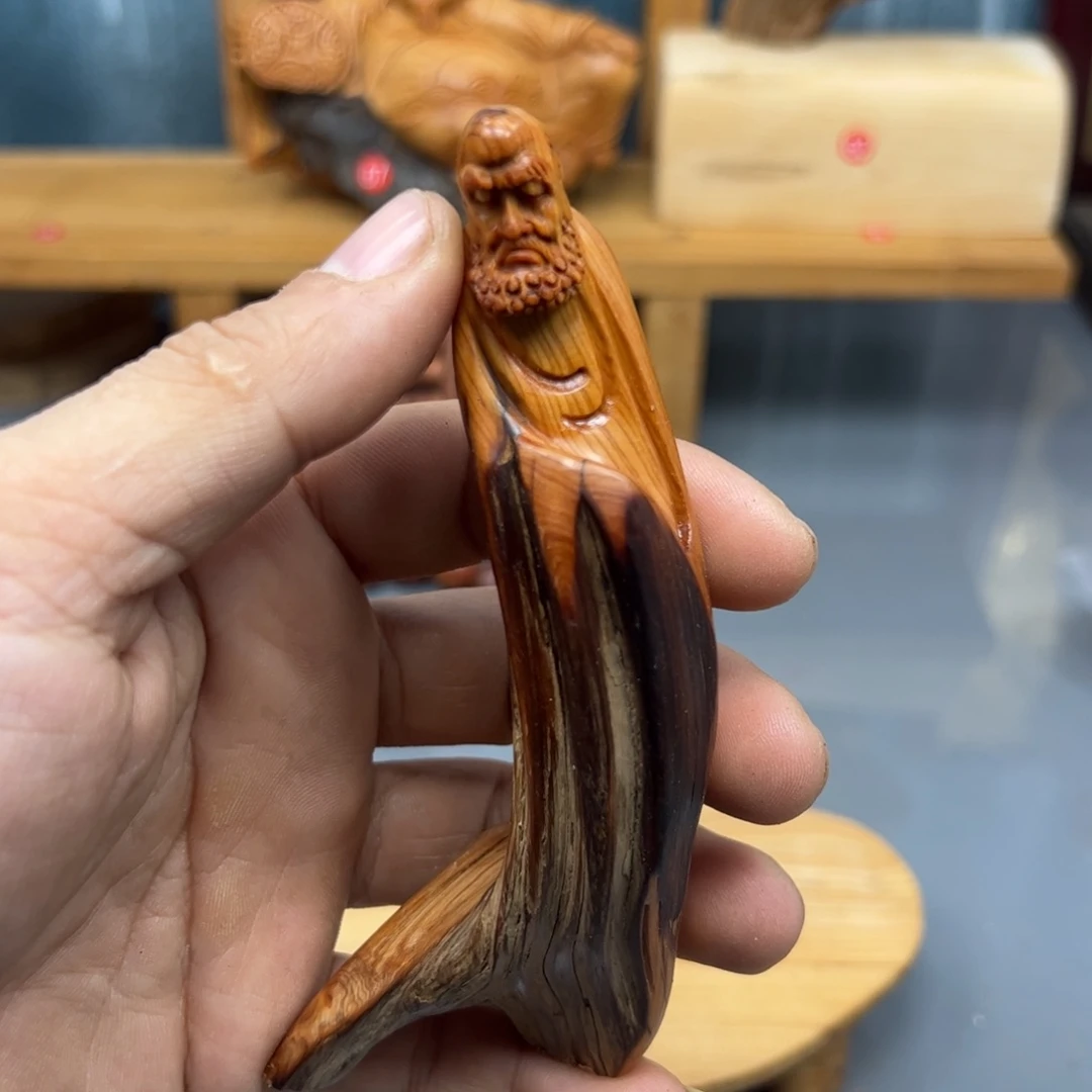影***了木崖柏木摆件手把件