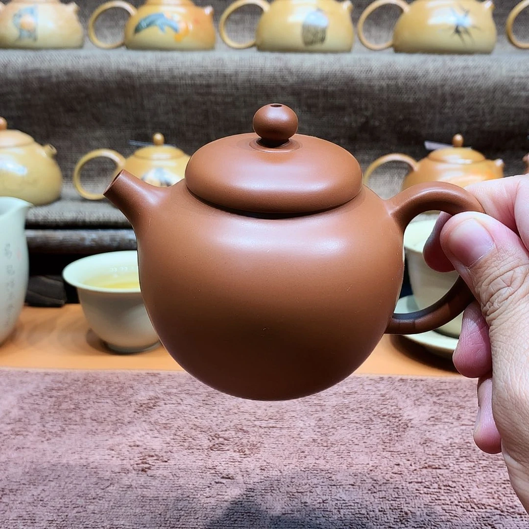 泥塑潘*师放漏复烧红色220毫升壶微瑕