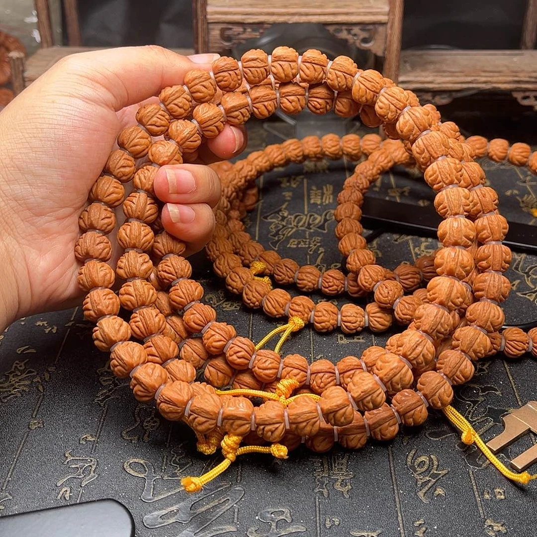 桃核吊坠小金豆手持