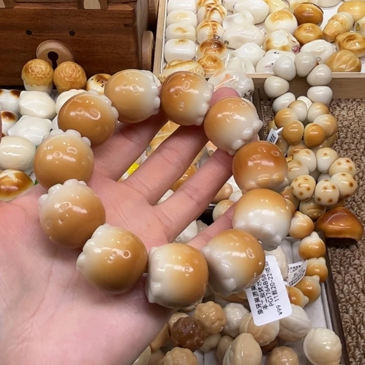 菩提根/象牙果把件12.10.23象牙果炭烤水母微瑕