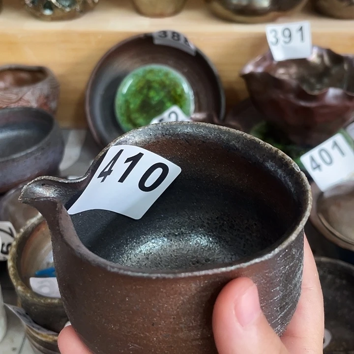 茶杯紫泥吞吞吐吐