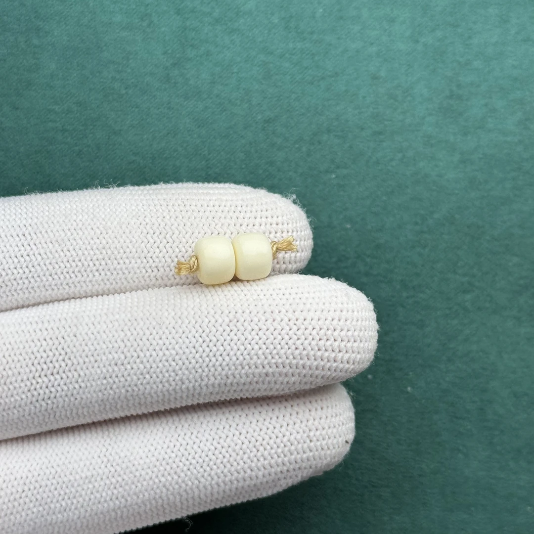 F3327天然原矿蜜蜡 对珠7.1*5.2mm 支持鉴定 假一罚十