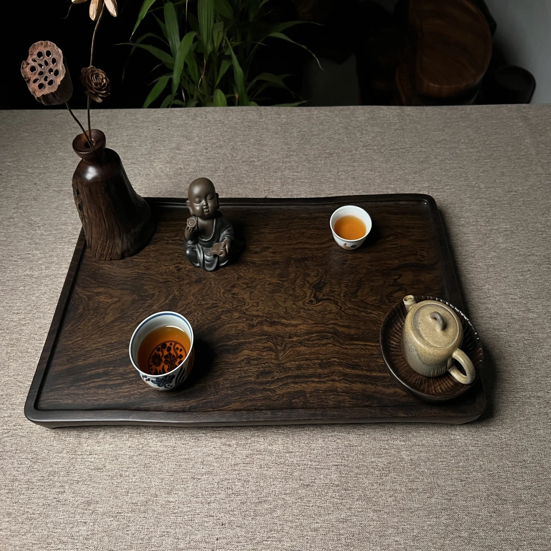 黑檀风车木鬼脸纹四足干泡台60×35×4
