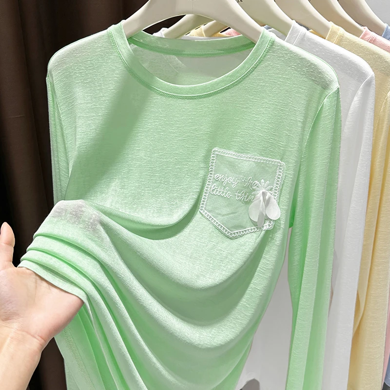 绿色套头长袖宽松上衣女夏季2025新款防晒薄款圆领设计感打底T恤