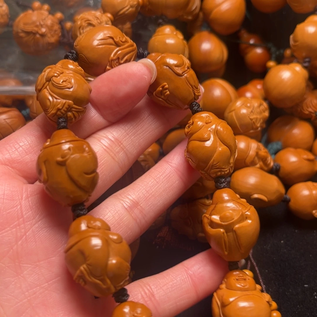 且***铃橄榄核吊坠米勒串