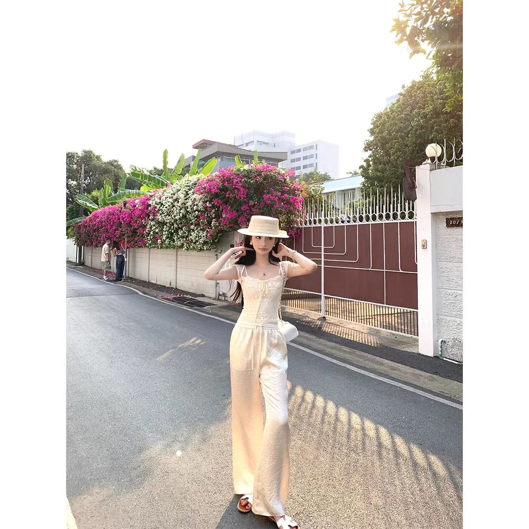 性感辣妹气质蕾丝吊带上衣女夏季2025新款设计感显瘦休闲长裤套装