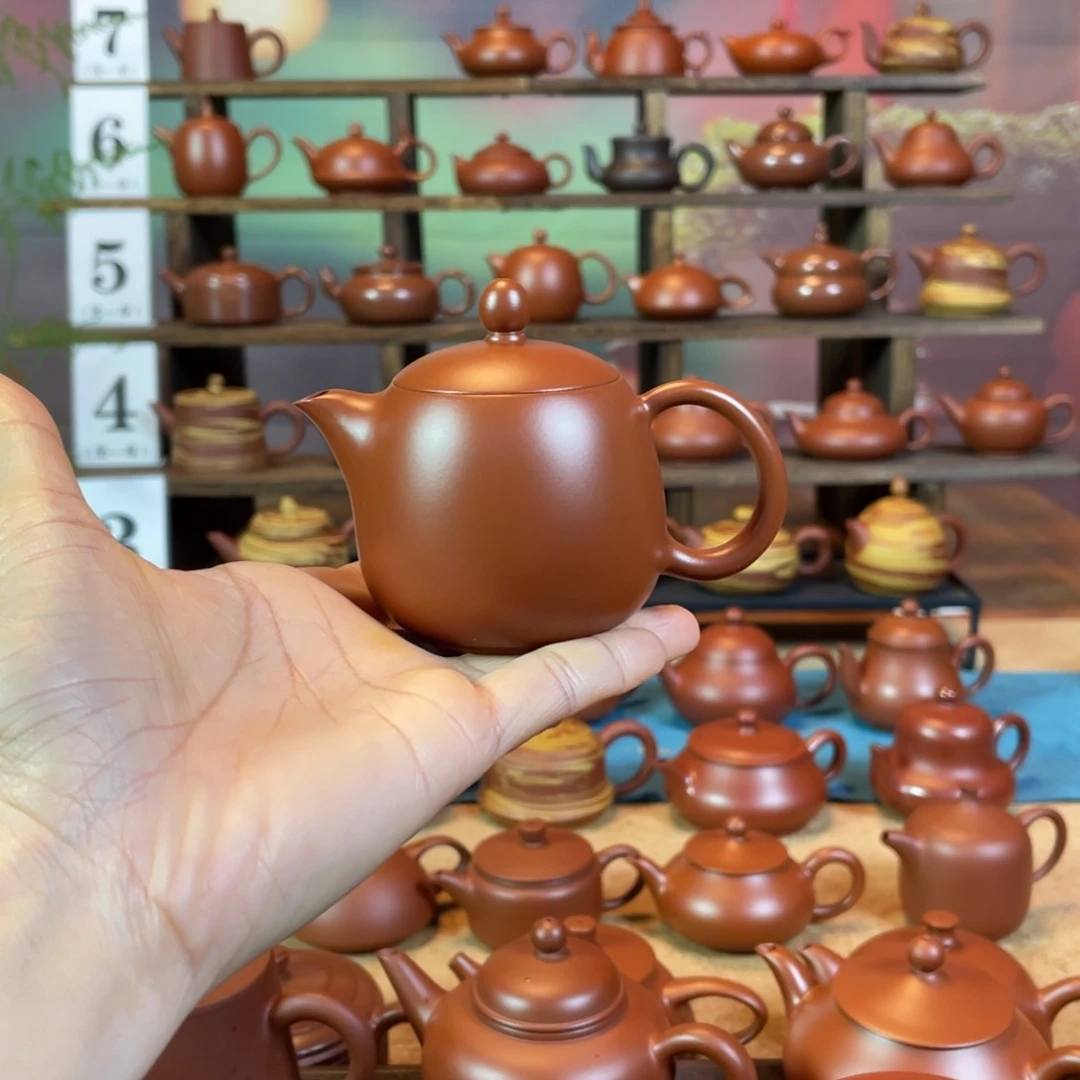 茶壶紫砂命****?潮州手工手拉朱泥龙蛋壶