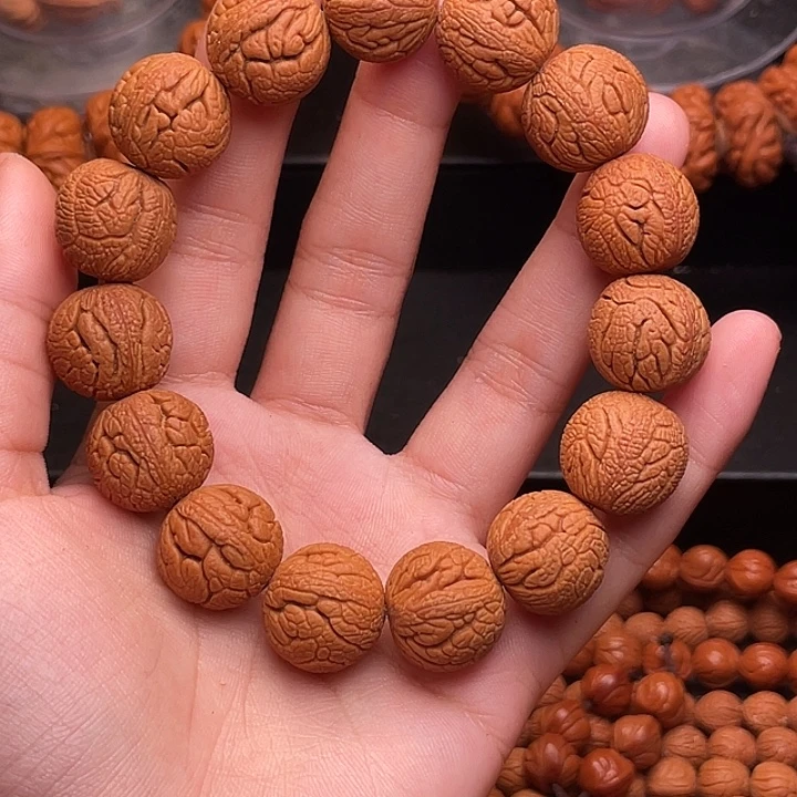 手串桃核金丝龙珠1.7