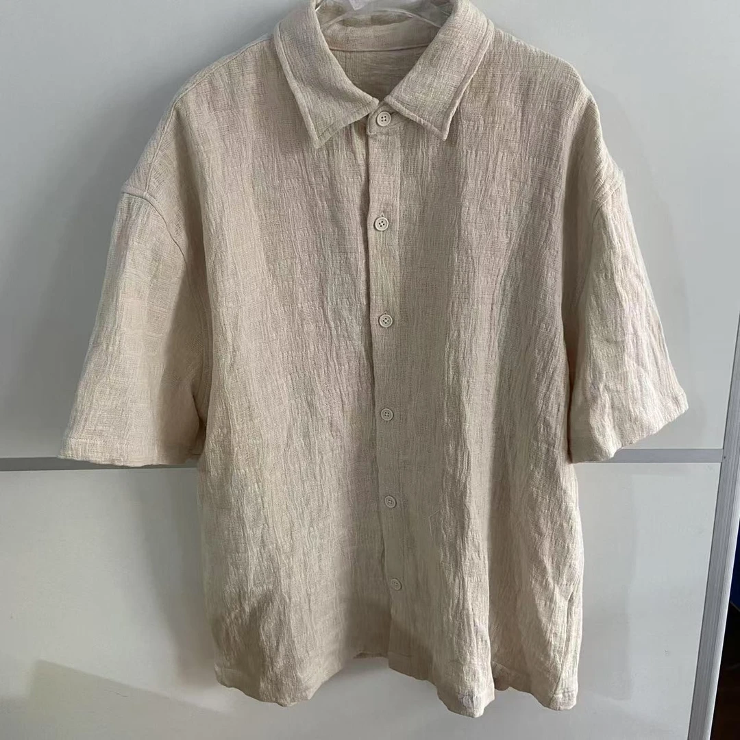 607/9023-2/139-9     日常度假休闲宽松褶皱米白短袖衬衫