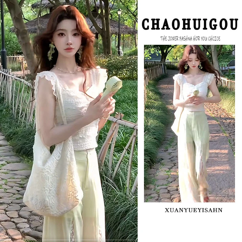 时尚套装女2025夏季新款气质甜美风修身上衣设计感拼接裤子两件套