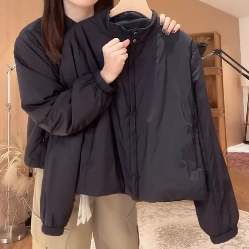 萱贝纯黑色简约轻薄款小棉服女2025秋冬新款宽松时尚显瘦短外套