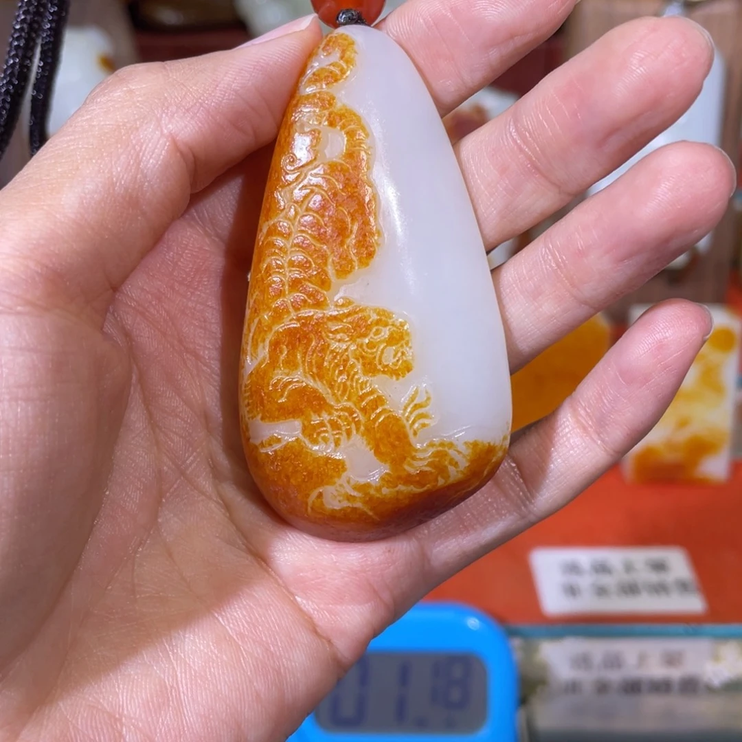 浩***。和田玉未镶嵌挂件