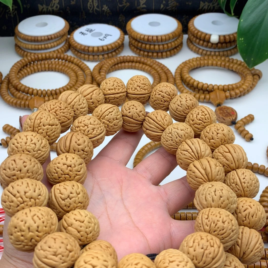 鲲***.桃核吊坠桃核手持