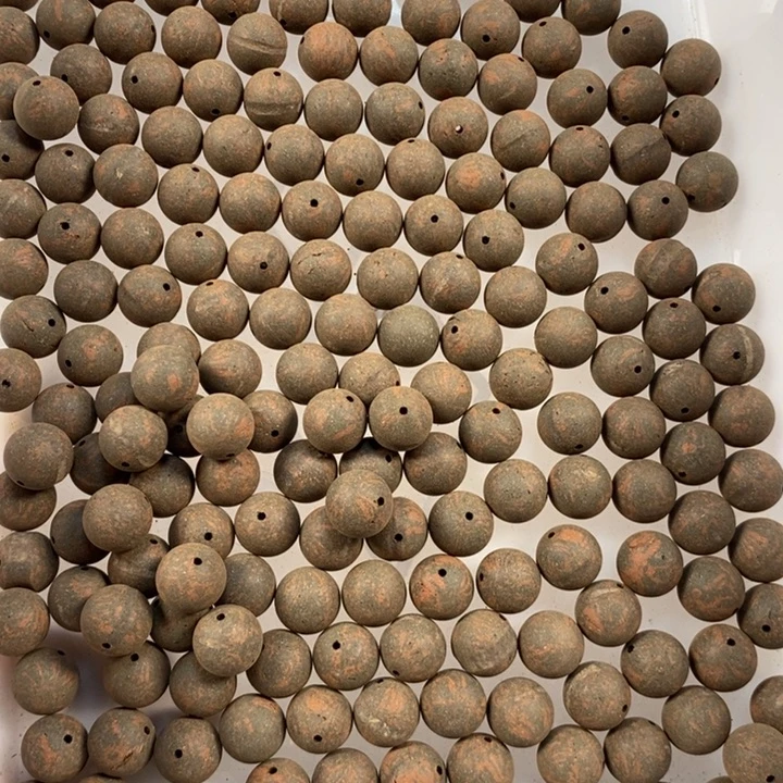 泥塑敦煌龙褐1.2打孔半成品瑕疵珠约200克