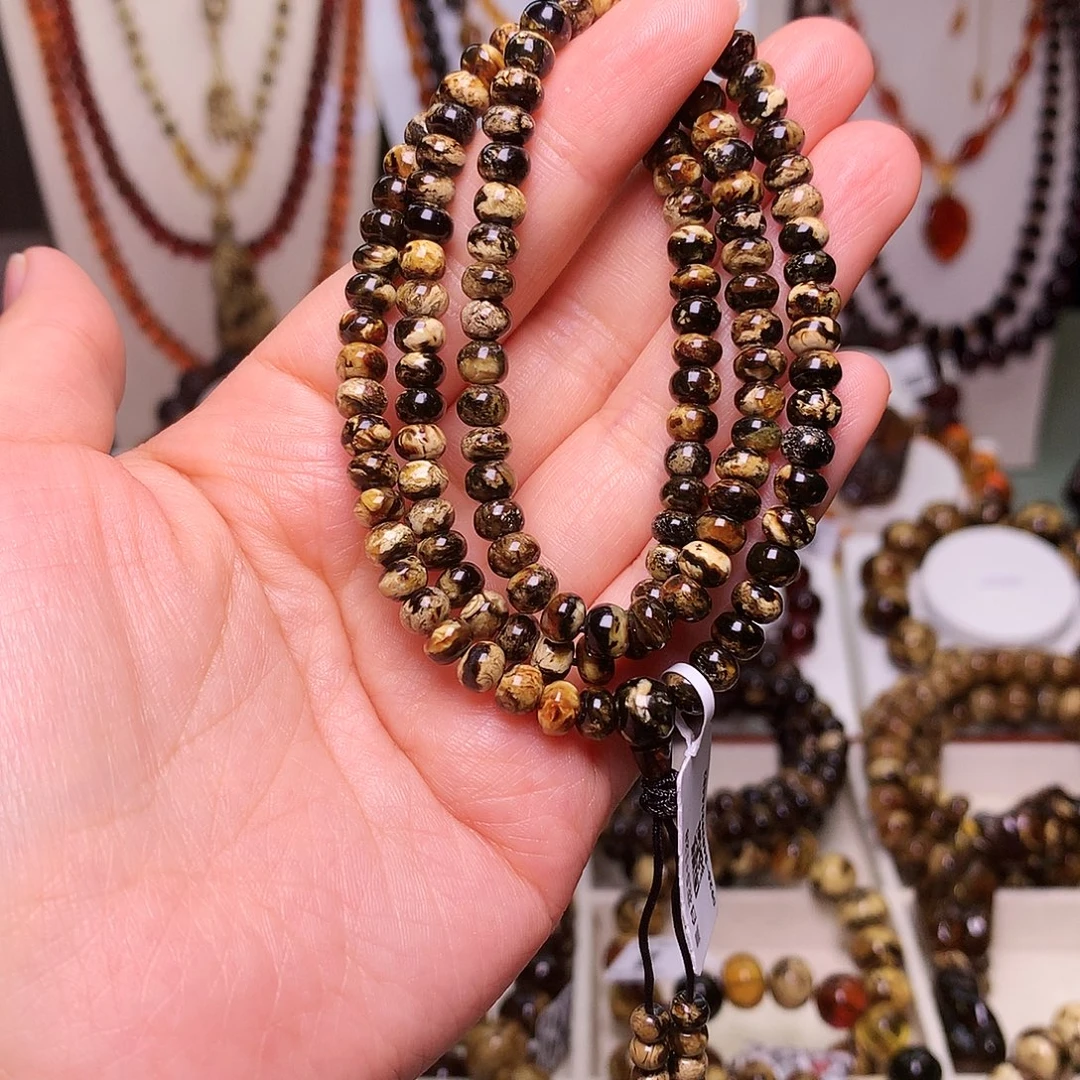 琥珀未镶嵌裸石5/128黑白妖花